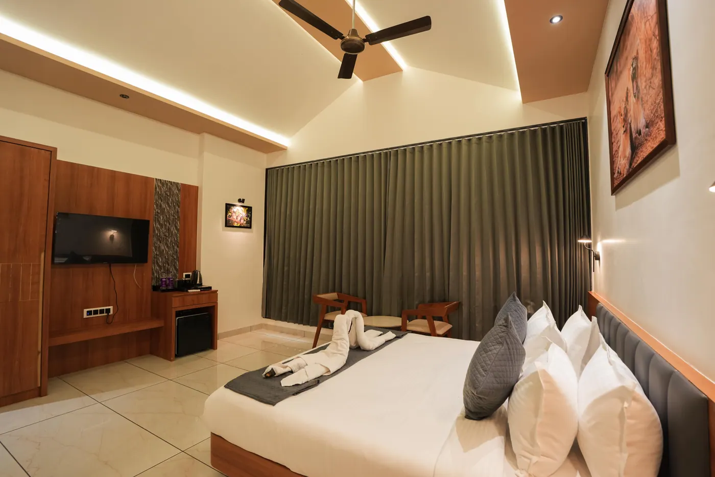 King bed in a Girtara guest room